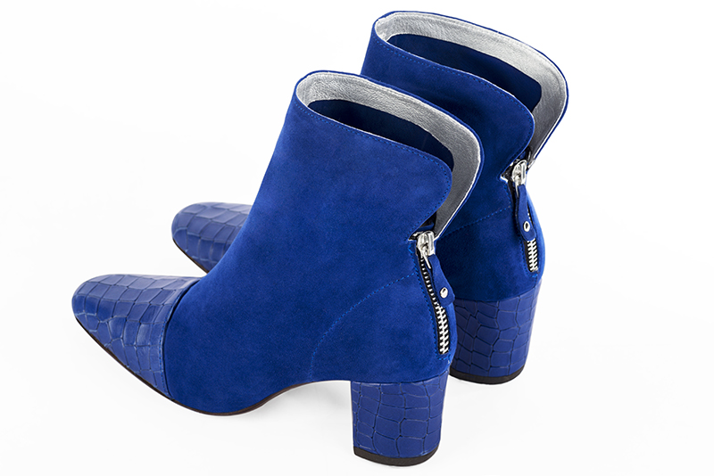 Electric blue women's ankle boots with a zip at the back. Square toe. Medium block heels. Rear view - Florence KOOIJMAN